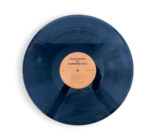 A Collection of Miles Davis Records: Miles Davis At Carnegie Hall, Bags Groove, Agharta