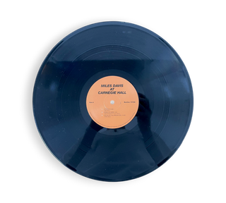 A Collection of Miles Davis Records: Miles Davis At Carnegie Hall, Bags Groove, Agharta