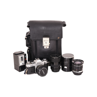 Canon AT-1 SLR Camera with 35-70mm Zoom Lens, 28mm Wide Angle Lens and Other Accessories