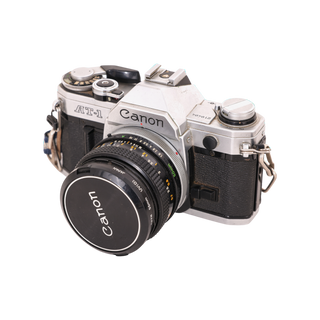 Canon AT-1 SLR Camera with 35-70mm Zoom Lens, 28mm Wide Angle Lens and Other Accessories